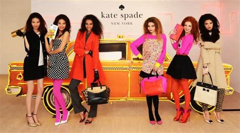 who bought out kate spade.